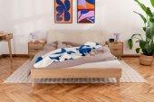 Greg bed with upholstered headboard